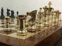 CHESSNCRAFTS BRASS METAL STAUNTON CHESS PIECES/COINS SET with FOLDING WOODEN CHESS BOARD 14 inches (non magnetic)- SPECIAL SLOTS STORAGE INSIDE BOARD-BEST for GIFTING, HOME DECOR & PLAYING.