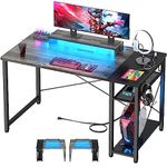 Cyclysio Reversible Computer Desk 47'' Gaming Desk with Shelf Writing Desk Table with Charge Outlets USB Ports Moveable Monitor Stand for Home Office, Bedroom