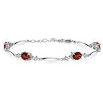 Gem Stone King 925 Sterling Silver Red Garnet and White Lab Grown Diamond Tennis Bracelet For Women | 3.78 Cttw | Gemstone January Birthstone | Oval 7X5MM | 6 Inch + 1 Inch Extender, One Size,