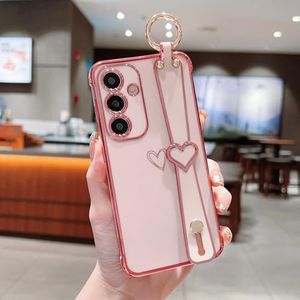 ZTOFERA for Samsung Galaxy S24 FE 5G Case with Wrist Strap,Luxury Cute Plating Edge Love Hearts Pattern for Girls Women, Finger Holder Kickstand Soft Shockproof Phone Case for Galaxy S24 FE 6.1",Pink