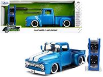 1956 F-100 Pickup Truck Metallic Light Blue with White Stripes and Extra Wheels Just Trucks Series 1/24 Diecast Model Car by Jada 31541