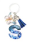 riKRishnaya Artworks All A-Z Alphabet/Letter Initials Blue - Green Stones Resin Keychain with Silver key ring for Women, Men, Car, Bike, Handbag, Purse | With Cute Butterfly & Tassel Charm (S)