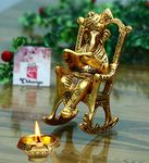 CHHARIYA CRAFTS Metal Lord Ganesh Reading Ramayana Statue Ganpati Sitting on Chair with Kuber Diya Idol for Home Office and Gifts Decor Corporate Gifts Decorative Showpiece - 14 cm (Metal, Gold)