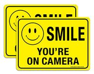 (2 Pack) Faittoo Smile You're On Camera Sign, Reflective 10x7 Rust Free .40 Aluminum, UV Protected, Weather Resistant, Durable Ink, Indoor & Outdoor Use for Home Business CCTV Security Camera