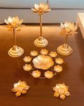 Metal Combo of Tea Light Holder Set of 3,1 Rangoli and 2 Diyas