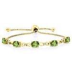 Gem Stone King 18K Yellow Gold Plated Silver Oval Green Peridot and Lab Grown Diamond Tennis Bracelet For Women (4.52 Cttw, Gemstone Birthstone, Metal Gemstone, Peridot lab-grown-diamond