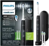 Philips Sonicare ProtectiveClean 5300 Rechargeable Electric Toothbrush, with Pressure Sensor, 3 Cleaning Modes, SmarTimer and QuadPacer, with 2 Bonus Brush Heads, Travel Case, Black, Model HX6423/34
