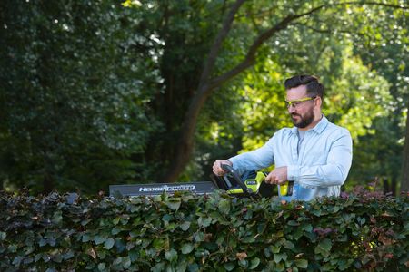 Ryobi 18V ONE+ Cordless Hedge Trimmer, 55cm Blade – Bare Tool