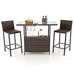 COSTWAY 3PCS Outdoor Rattan Bar Set, Metal Frame Dining Table and Bar Stools with Storage Shelves, 3 Goblet Racks, Glass Tabletop and Footrests, Counter Height Wicker Bistro Set for Deck Poolside