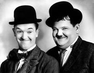 Posterazzi MINEVCPBDLAANEC011H Laurel and Hardy Photo Print, 8 x 10