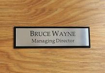 Gugan's Customized Self Adhesive Acrylic Name Plate| Black Acrylic and Silver Engraving Sheet with Vinyl Lettering | Custom Name Plate For Home, Office & Outdoor Entrance 12 x 4 Inches (Silver)