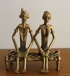 Advaita Handicrafts Brass Metal Dhokra - Tribal Couple on a cot; 11 x 12 CM