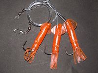 SUPER CATCH GLITTER ORANGE SQUID RIG LURE 3 x 6/0 HOOK BOAT WRECK COD SEA FISHING LINE CLIP