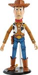 Mattel Pixar Spotlight Series Woody Figure, Disney Pixar Toy Story Collectable, 9.2-in Tall with 2 Hand Sets, 2 Expressions, Articulation & Display Box with Reversible Background