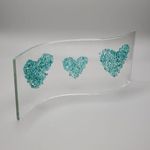 Handmade fused glass curved panel/suncatcher with aqua crushed glass hearts