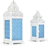 CVHOMEDECO. Decorative Candle Lantern Moroccan Lanterns Rustic White Metal Lantern Holder for Home Patio Outdoor Decor. Blue Glass, Set of 2