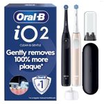 Oral-B iO2 Duo Electric Toothbrushes, 2 Handles, Night Black and Calm Pink - 2 Gentle Care Toothbrush Heads, 1 Travel Case, 1 Travel Refill Holder, Designed by Braun, UK 2 Pin Plug