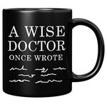 A Wise Doctor Once Wrote Funny Doctor Gifts Dr Mom Dad Husband Wife Boyfriend Girlfriend Graduation Gifts for New Physician Surgeon Medical Student MD Practitioner Ceramic Mug (Black, 11 oz)