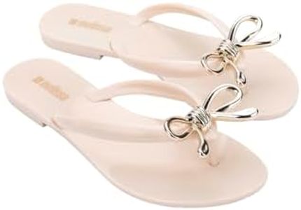 Melissa Harmonic Womens Fashion Sandals - Dressy Flip Flops with Metallic Bow - Lightweight PVC, Flexible Design - Summer Sandals for Women, Flat & Flexible, Iris, Beige/Gold, 8