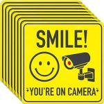 ASSURED SIGNS Smile You're On Camera Sign Stickers - 7 X 7 Inch - 8 Pack - Polite Video Surveillance Signs to Prevent Trespassing on Private Property - Perfect for House, Business, Yard or Private Driveway