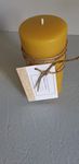 beeswax Christmas candles..A beeswax pillar candle stands 5.5 inches tall and is 2.5 inches wide. Weighs 326 g