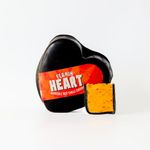 Flamin Heart Chilli Cheese 200g. A Delicious Cheddar Cheese With A Chilli Kick, Sealed In Heart Shaped Black Wax. The Perfect Valentines Cheese Gift. The Chuckling Cheese Company.