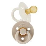 Itzy Ritzy Natural Rubber Pacifiers, Set of 2 – Natural Rubber Newborn Pacifiers with Cherry-Shaped Nipple & Large Air Holes for Added Safety; Set of 2 in Coconut & Toast, Ages 0 – 6 Months