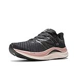 New Balance Women's FuelCell Propel V4 Running Shoe, Black/Quartz Pink/Pink Moon, 9.5