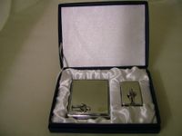 Cigarette case and lighter with rugby player badge