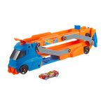 Hot Wheels Toy Car, Truck, Hauler & Track with 1:64 Scale Toy Car, Large Truck Transforms into 2.5+-ft Raceway with a Launcher, Stores up to 9 1:64 Scale Cars, Connects to Other Sets, HYT83