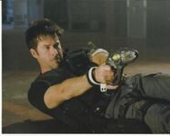 Stargate Atlantis Joe Flanigan as Lt. Colonel John Sheppard Shooting Wraith Weapon 8 x 10 Photo