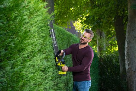 Ryobi 18V ONE+ Cordless Hedge Trimmer, 55cm Blade – Bare Tool