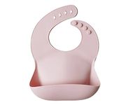 Mushie Baby Silicone Bib | Adjustable Fit Waterproof Bibs | Easy Wipe Baby Feeding Bibs | 4 Adjustable Sizes with Deep Front Pockets | 100% BPA and Phthalate Free (Blush)