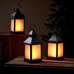 Lights4fun Set of 3 Outdoor Garden Black Candle Lanterns Battery Operated Flickering Amber LED Flame Effect Fully Waterproof