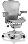 Herman Miller Aeron Task Chair: Highly Adjustable w/PostureFit Lumbar Support - Fully Adjustable Vinyl Arms - Tilt Limiter - Size B - Standard Carpet Casters - Titanium Smoke Frame/Classic Zinc Pellicle - Size B (Medium)