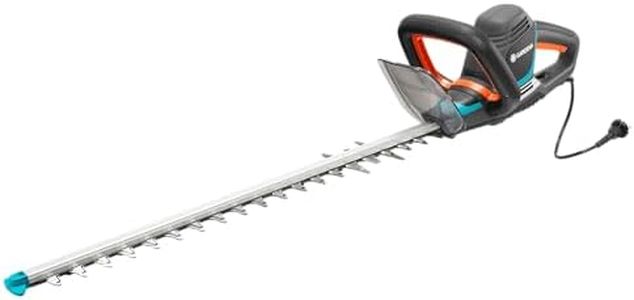 Taille-haies électrique PowerCut 700/65 de Gardena : taille-haies avec moteur de 700 W, 65 cm de longueur de lame, écartement des dents de 27 mm, poignée ergonomique et butée de protection (9835-20)