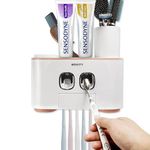 Toothbrush Holder Wall Mounted, WEKITY Multi-Functional Toothbrush and Toothpaste Dispenser for Bathroom, with 5 Toothbrush Slots, 2 Toothpaste Squeezers and 4 Cups(Pink)