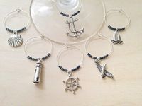 Nautical Themed Wine Charms, Ships Ahoy, Sailing gift for one who loves the Sea. Includes Anchor, Ship Wheel, Lighthouse, Sailboat etc. Stocking Stuffer for Beach lover. Set of 6. NAVY BEADS.