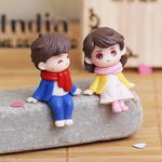 eCraftIndia Cute Boy and Girl Sitting Couple Statue Decorative Showpiece - Valentine Gift for Girlfriend, Boyfriend, Husband, Wife, Him, Her (Polyresin, Multicolor)