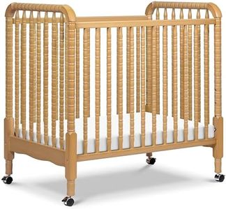 Davinci Jenny Lind 3-in-1 Convertible Mini Crib in Honey, Removable Wheels, Greenguard Gold Certified